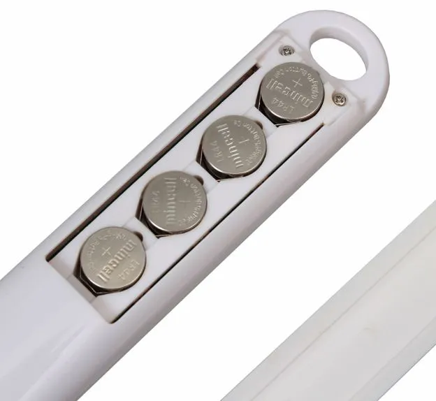 The device is powered by four 1.5-volt LR44 batteries