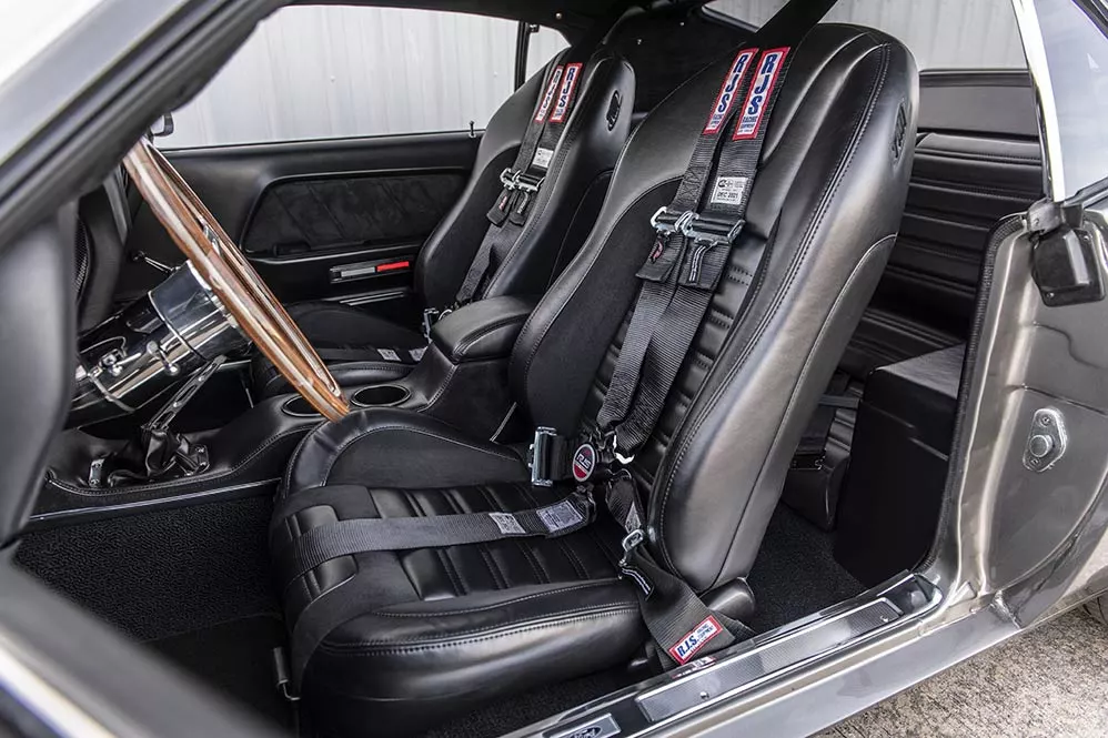 The Scat Elite Highback seats in the Mach 1 Hitman are embraced by 5-point harnesses