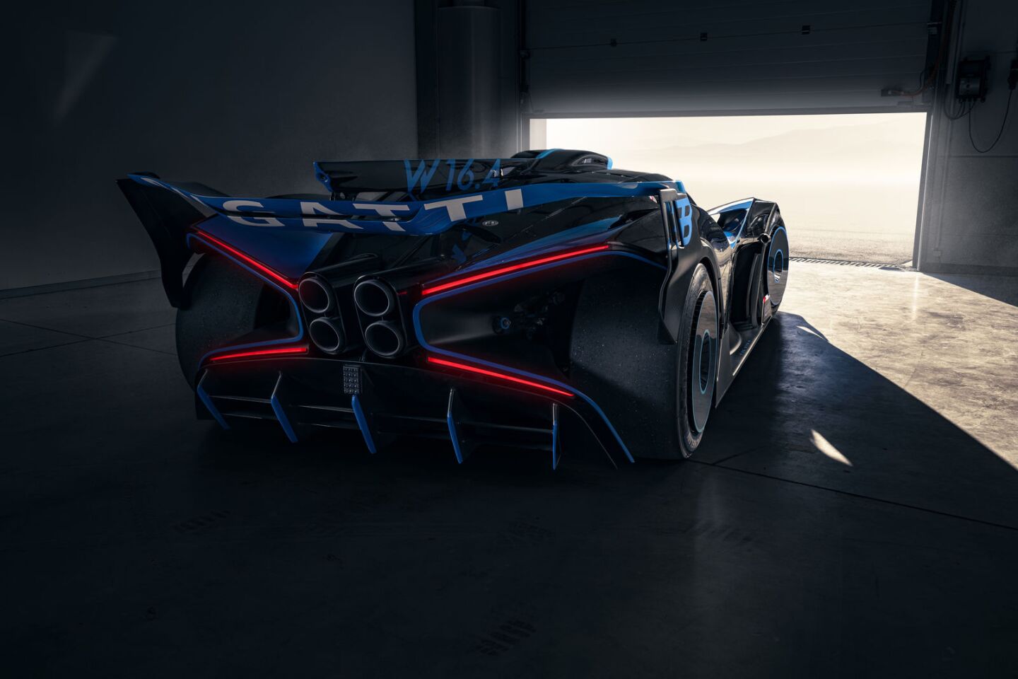 Bugatti extracts an extraordinary amount of downforce at the back end with this X-winged arrangement, the beefy wing and an aggressive underbody kit