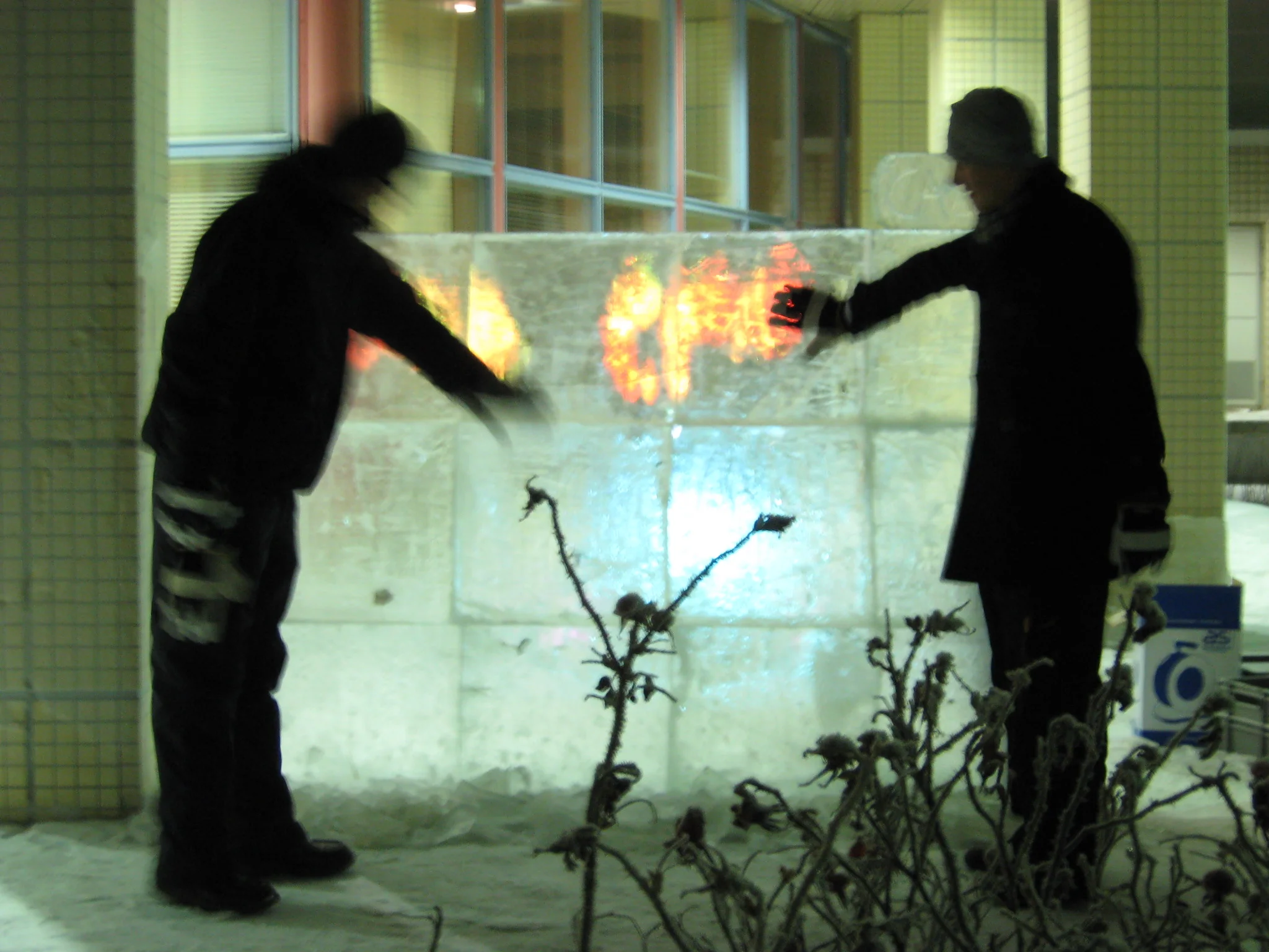 The hand movements of both gloved and ungloved users were tracked using rear-diffused illumination multi-touch tracking technology and an image of flames projected behind the moving hands in real-time
