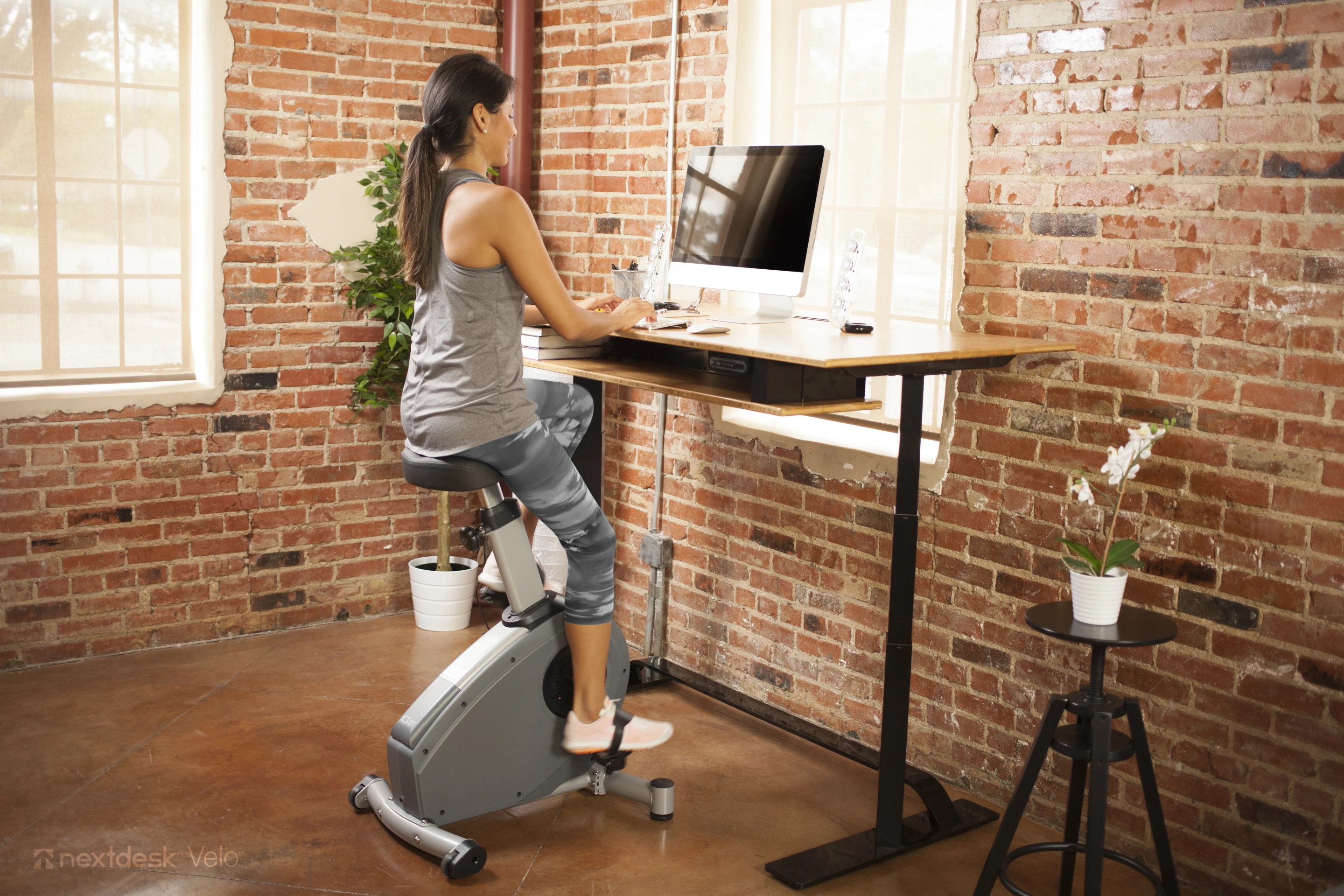 Velo pairs with a standing desk for a sitting workout