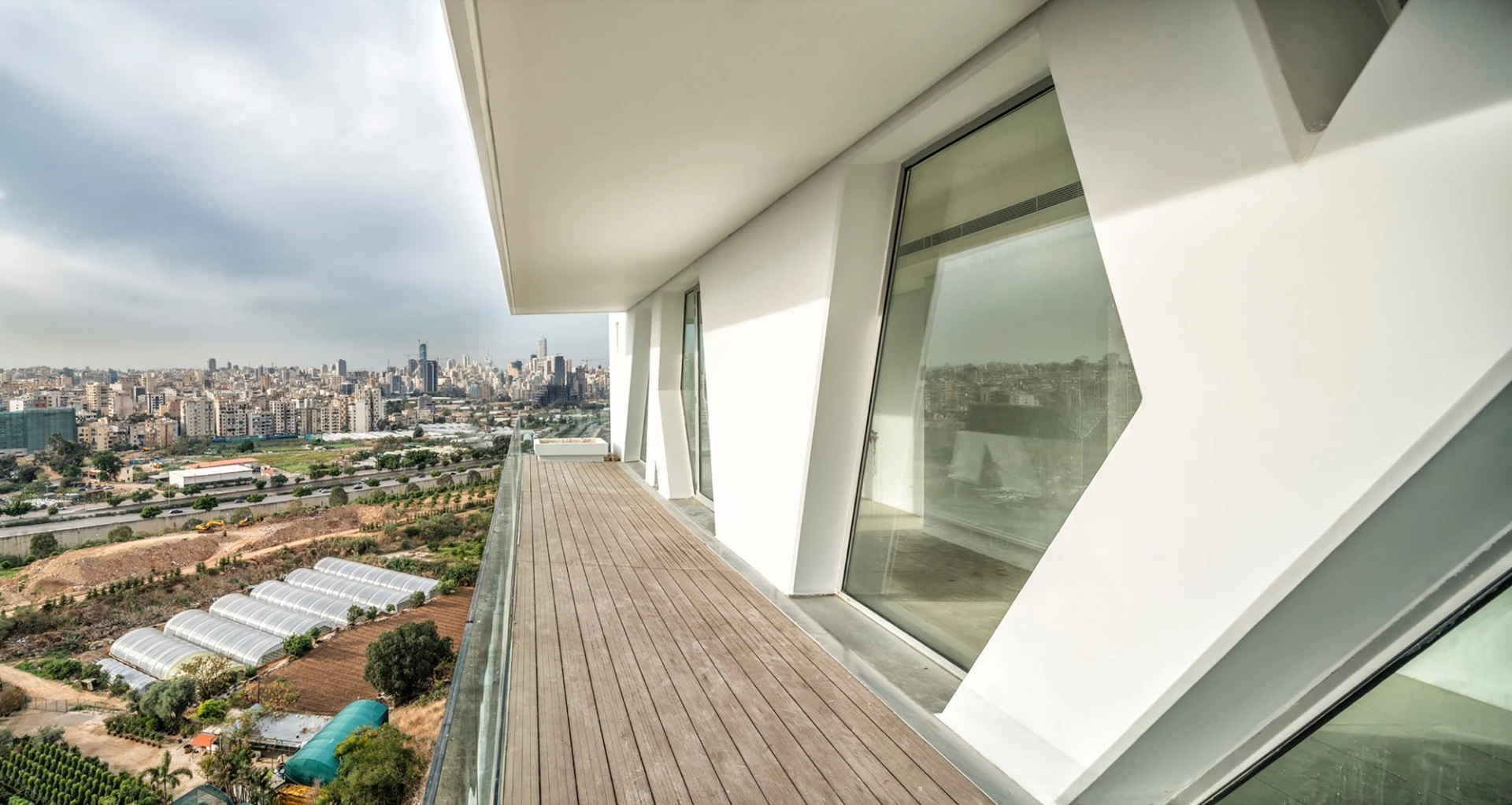 Each floor sports an outdoor sheltered terrace made from its downstair's neighbor's roof