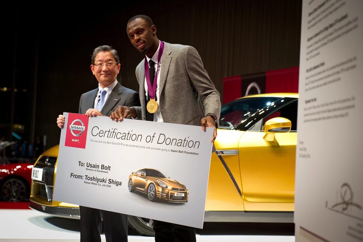 Usain with the Bolt Gold GT-R