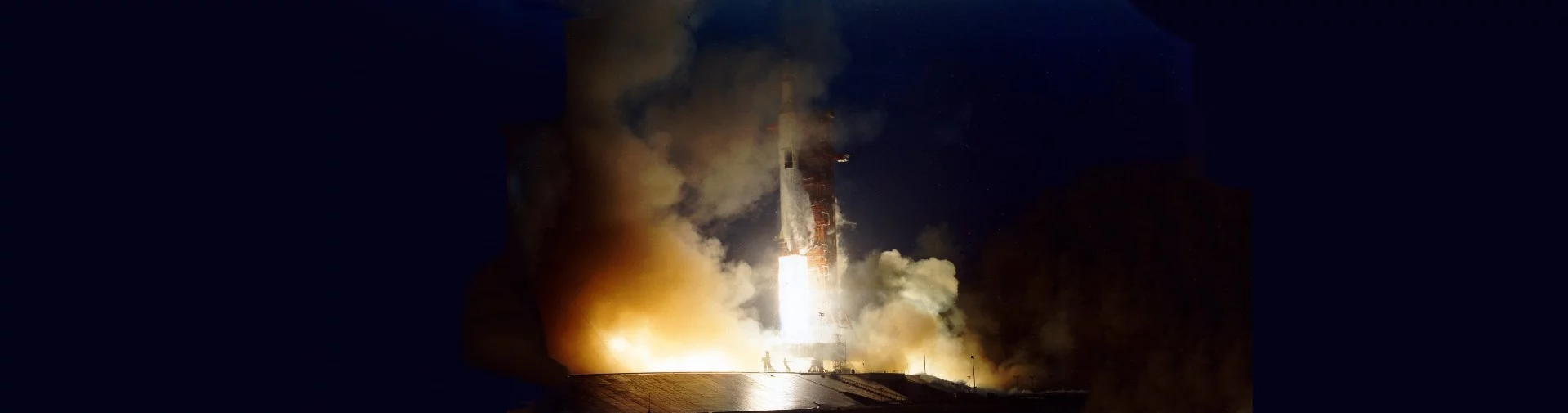 The Apollo 12 Saturn V rises from the pad