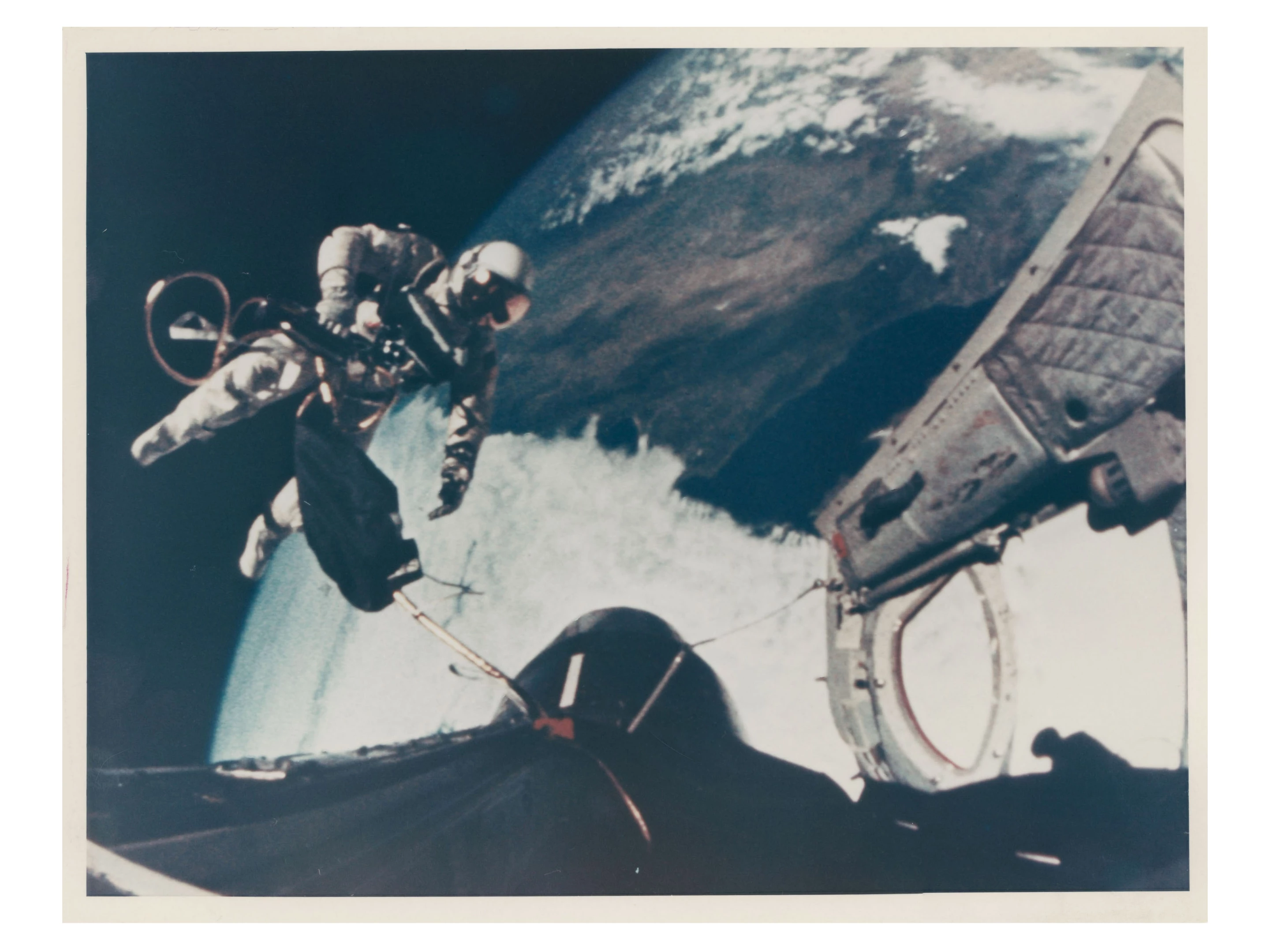First US Spacewalk: views of Ed White returning to the spacecraft at the end of the EVA, June 7, 1965 | Sold for: $3,655 (£2,750) by Christie's on November 20, 2020
