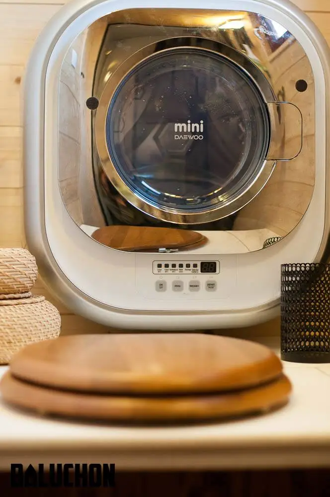 The Ondine's tiny wall-mounted washing machine