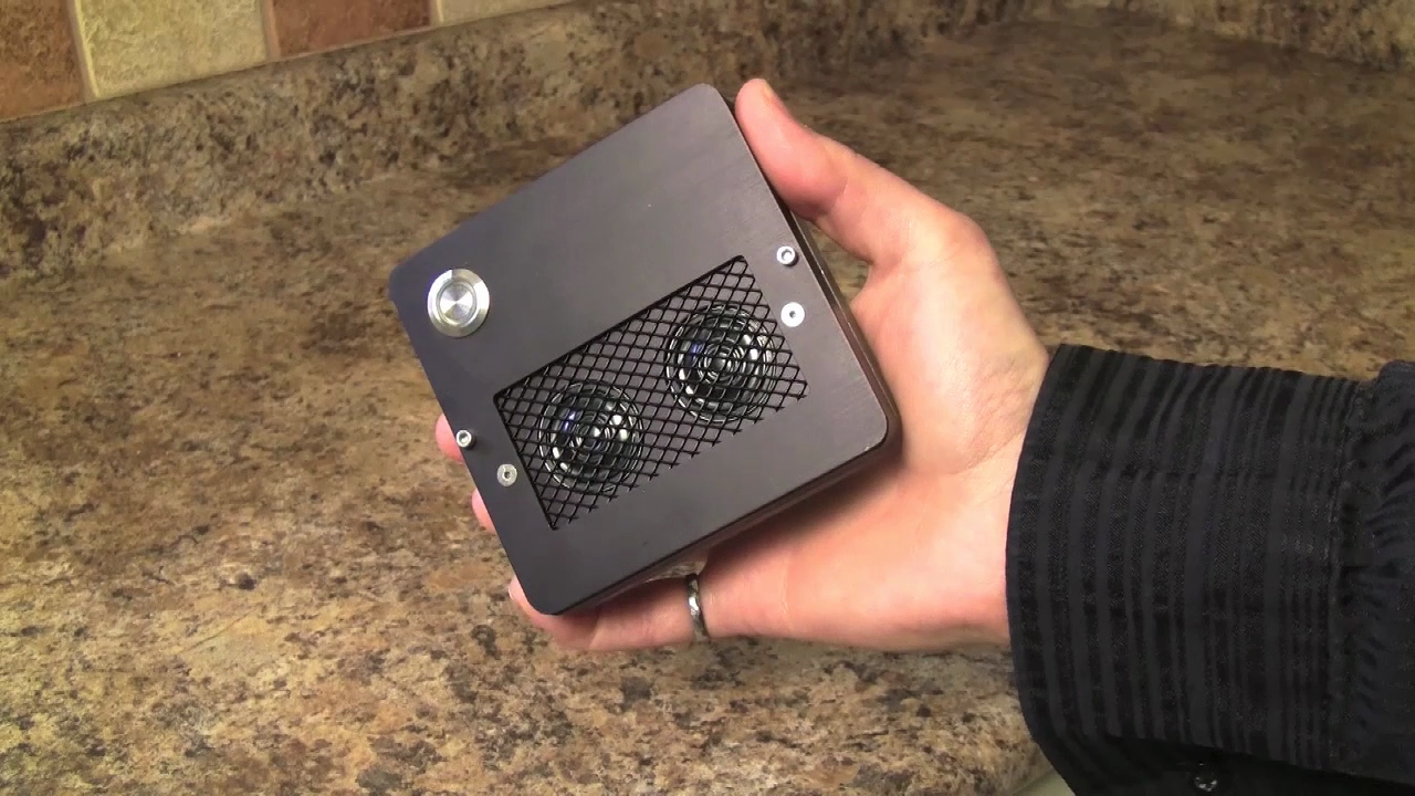 To the front, a power on/off button, stereo speakers and an omni-directional microphone