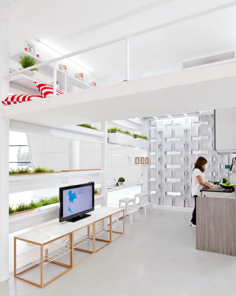 Much of the furniture serves dual purposes, with stairs also serving as shelves, for example