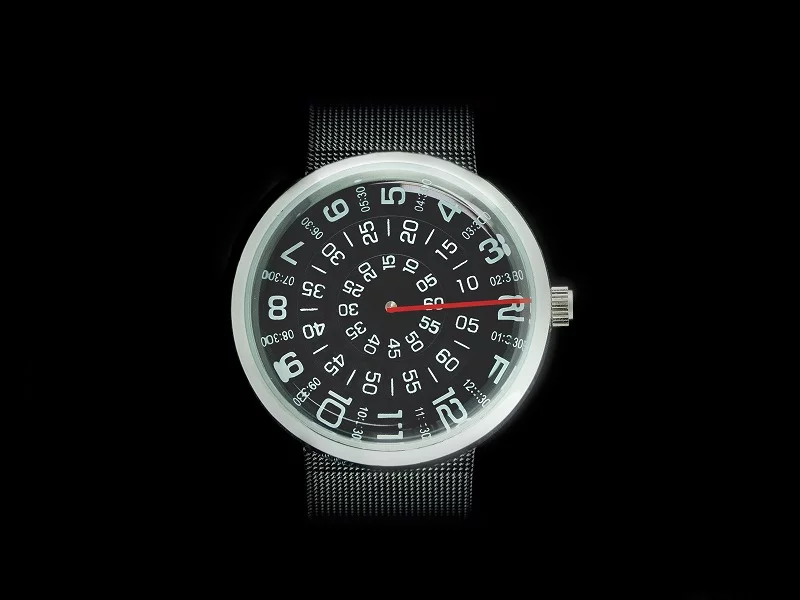 The hours, minutes, and seconds sweep past the stationary hand in concentric circles
