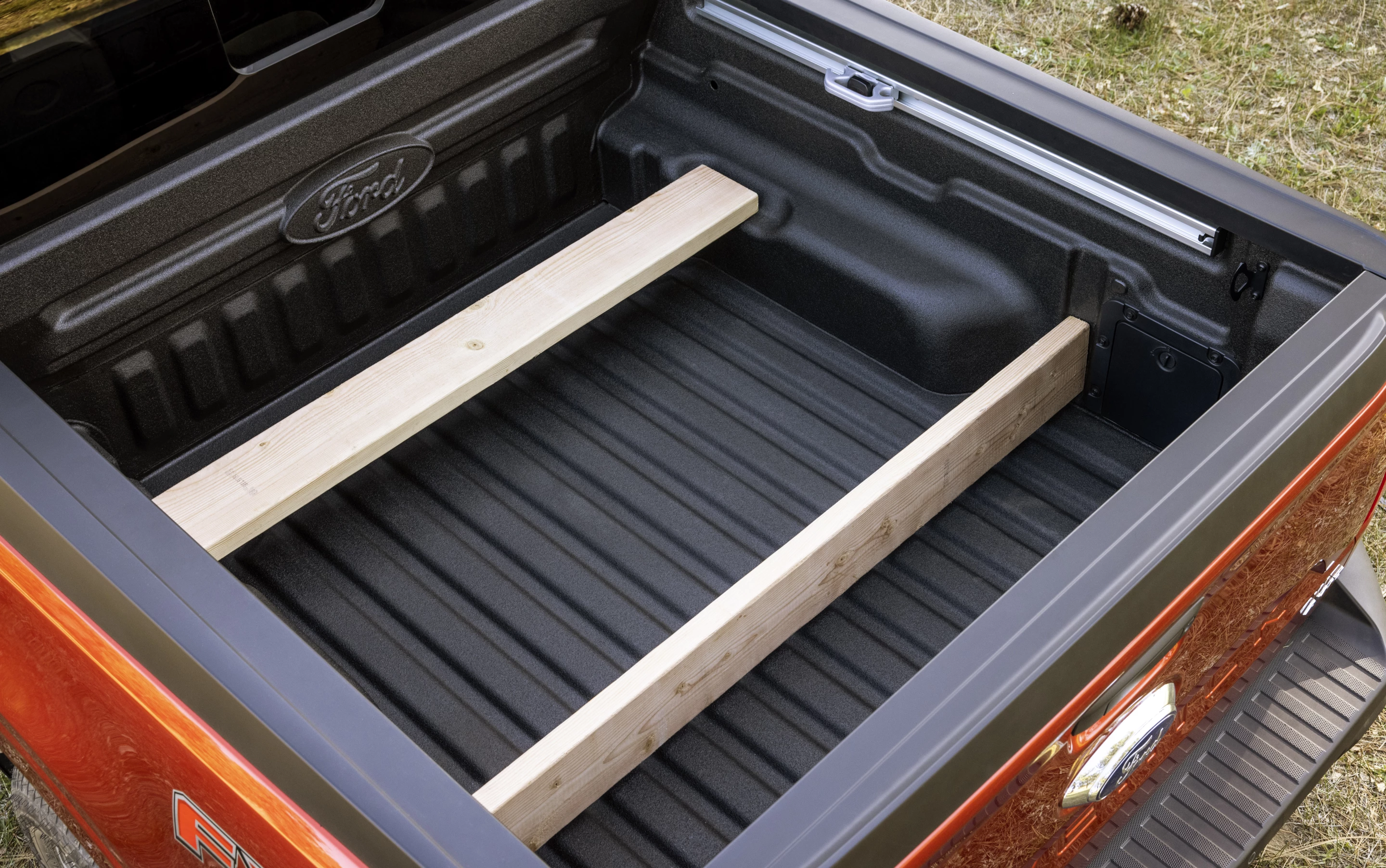 With creative use of construction lumber, several configurations for load dividing and securement can be devised – Ford offers suggestions via the Maverick's in-bed QR code panel
