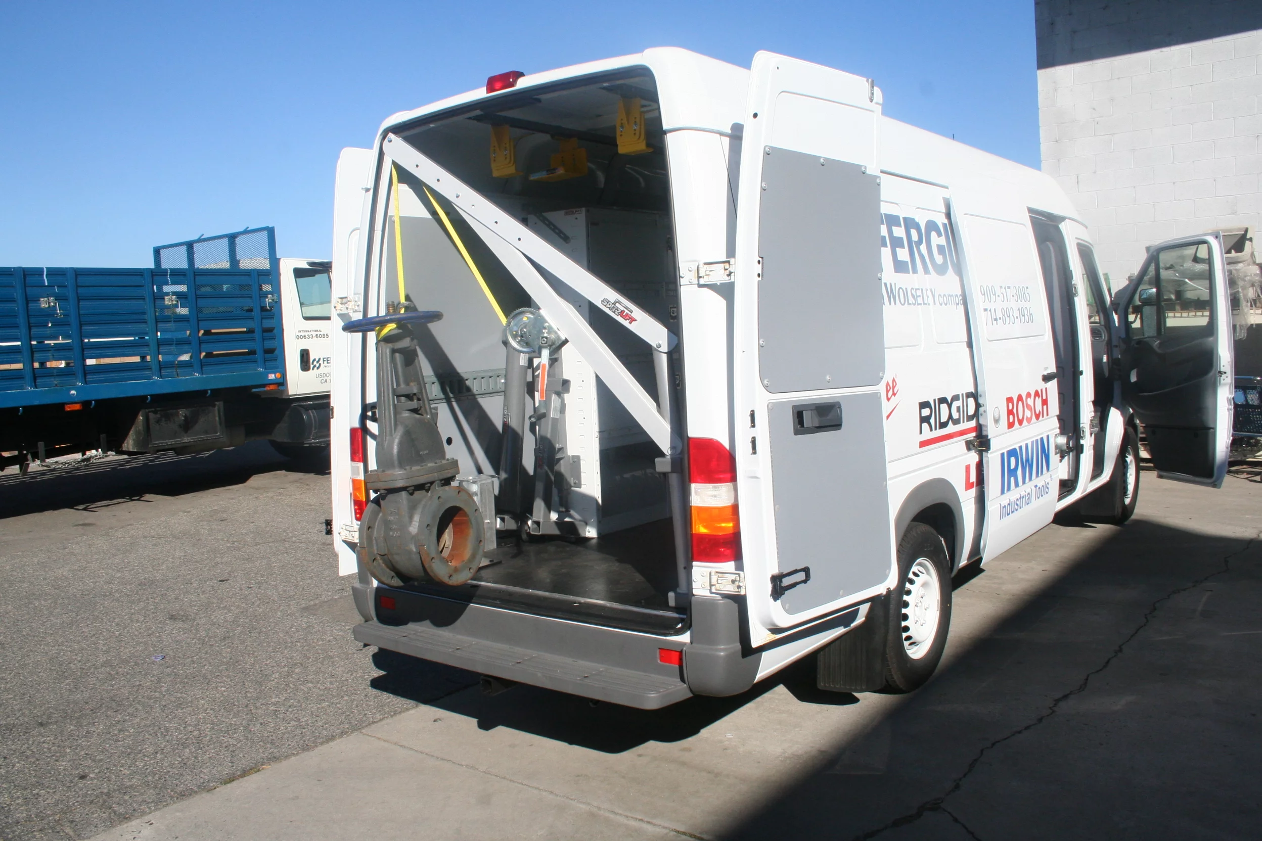 Spitzlift's miniature crane in a van
