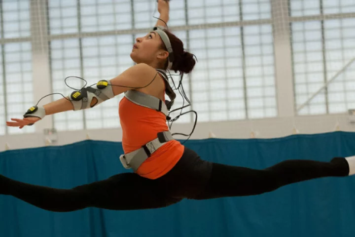 U.K. Olympic hopeful Mimi Cesar using the MotivePro vibrating suit to help perfect her rhythmic gymnastics routine