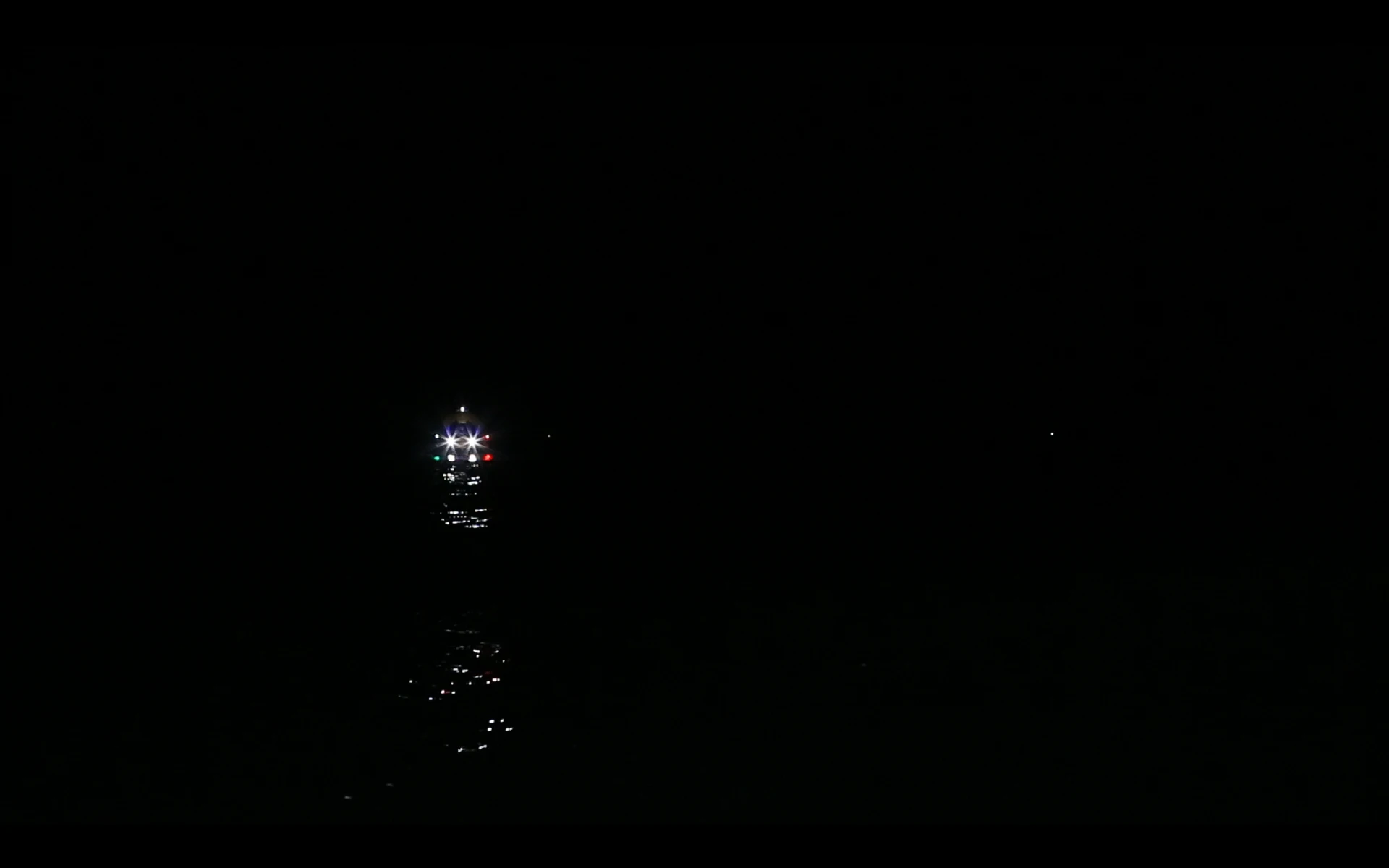 Jet Capsule floats by night