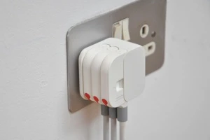 The adapter with three Folding Plugs takes barely more room than a standard UK plug (Credit: Min-Kyu Choi)