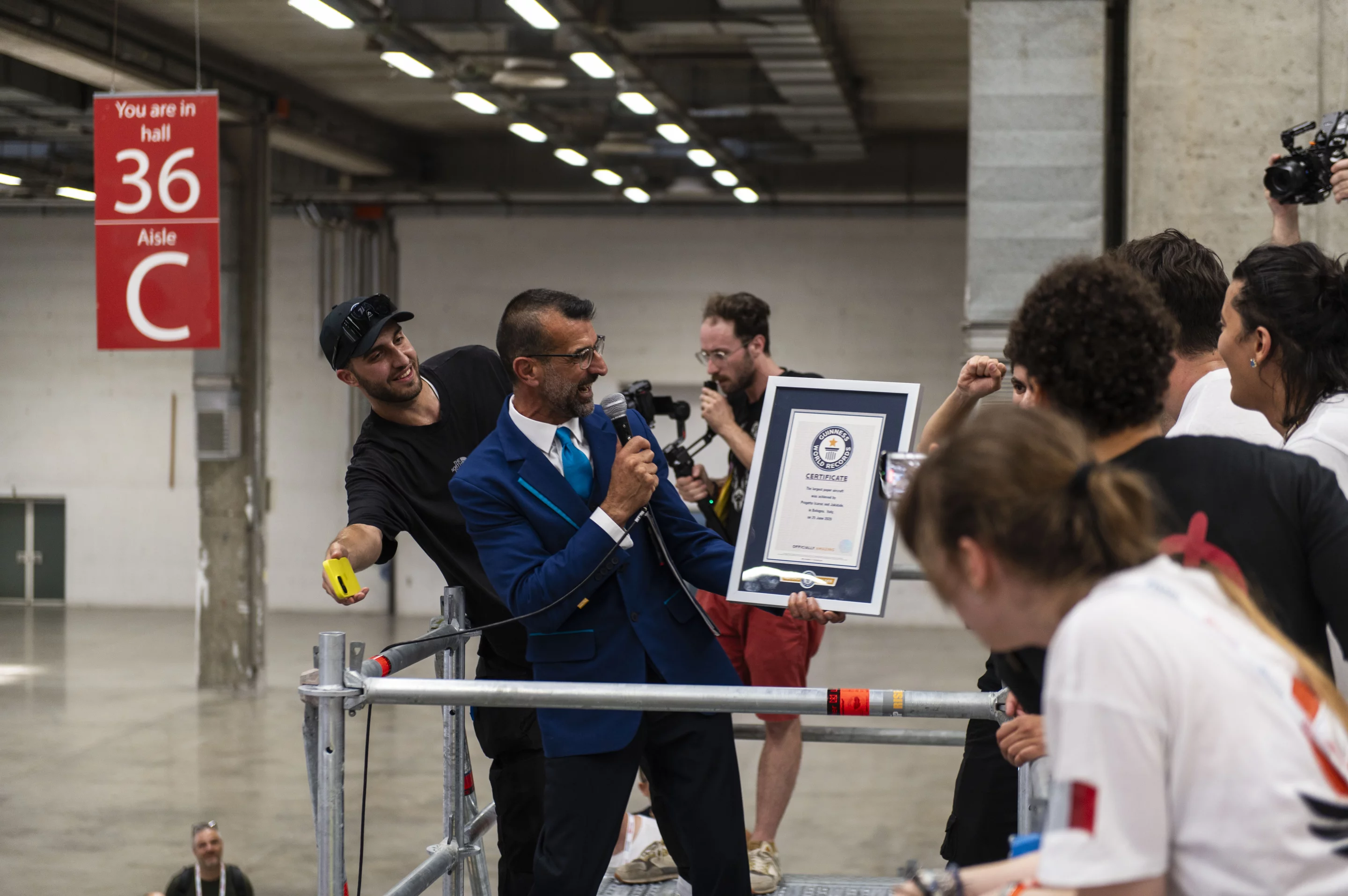 Official judge presents the Guinness World Record certificate