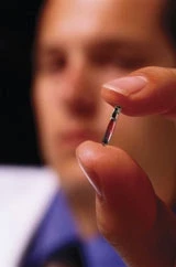 The VeriChip is thesize of a grain of rice