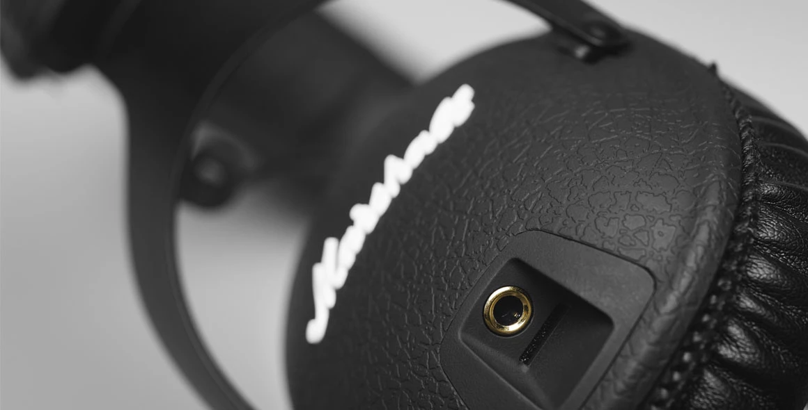 The detachable audio cable can be plugged in either ear piece