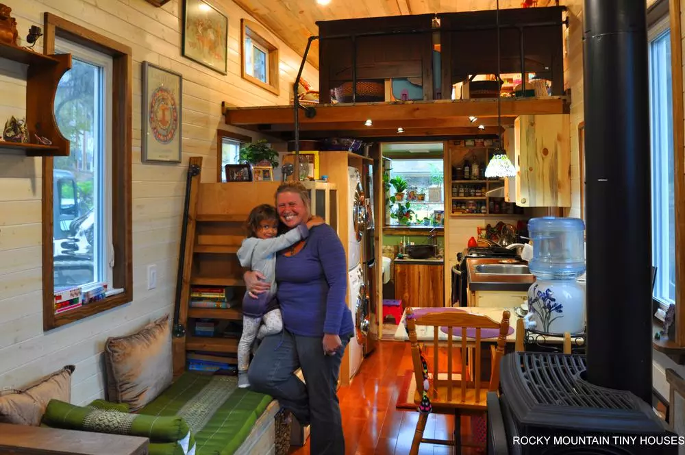 The Red Mountain 34' Tiny House is based on a triple-axle trailer and weighs an estimated 14,000 lb (6,350 kg)