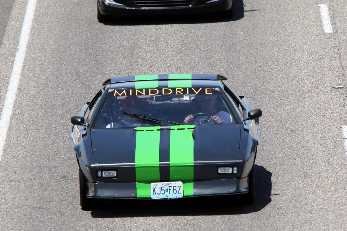 MINDDRIVE mentors and 15 at-risk students converted a 1977 Lotus Esprit to electric-only drive and then drove it coast-to-coast across America