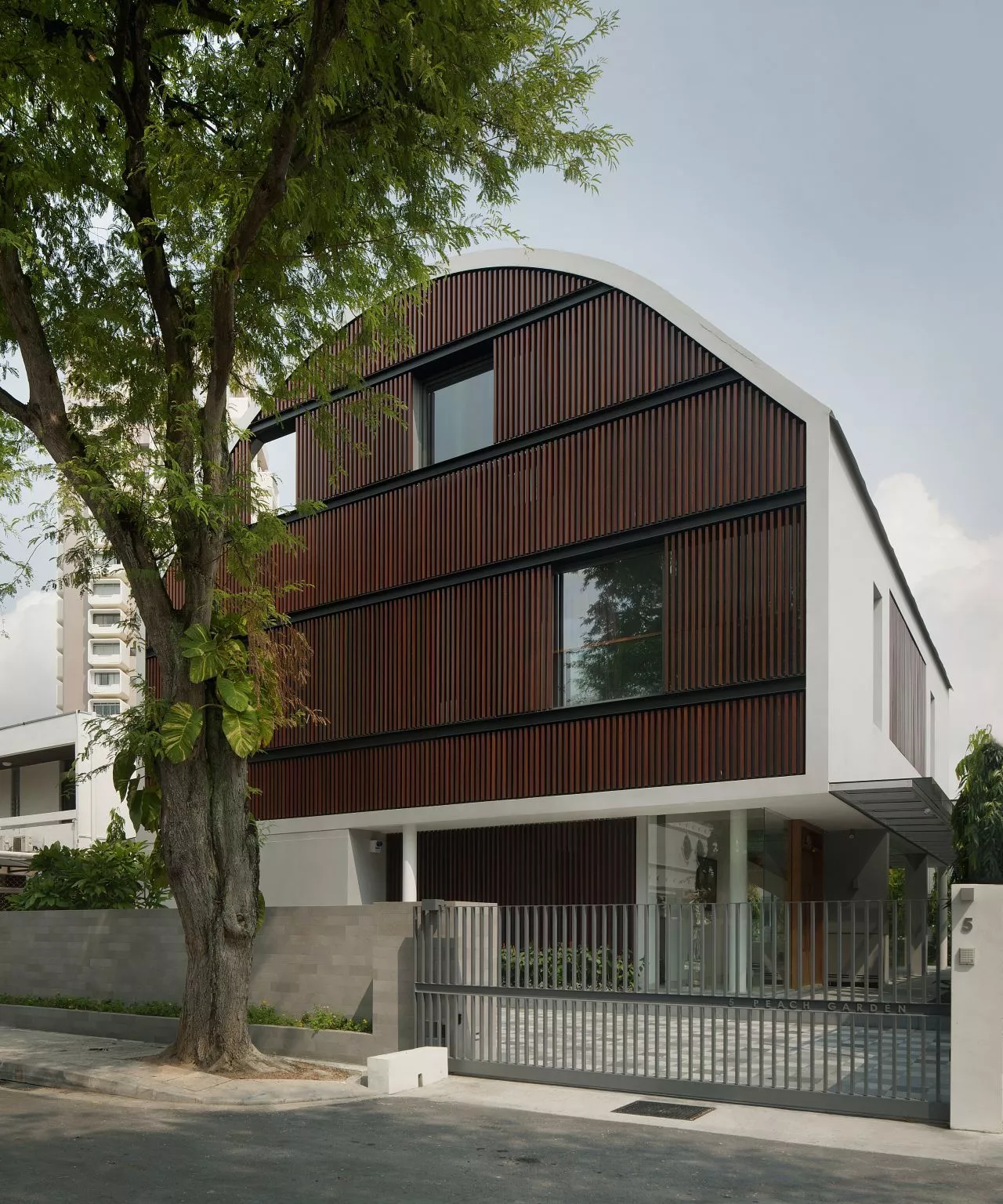 The north and south facades feature multiple function timber screens (Photo: Jeremy San)
