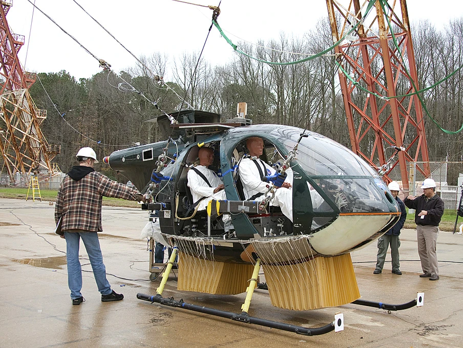 Researchers at NASA's Langley Research Center are testing the "deployable energy absorber" with the help of a helicopter donated by the Army and crash test dummies
