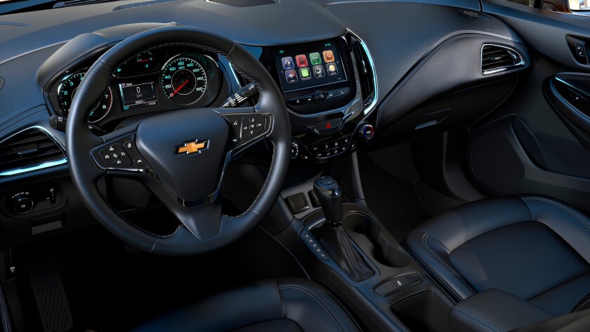We like the dashboard design, the center focal point of which kind of looks like BB-9E’s head