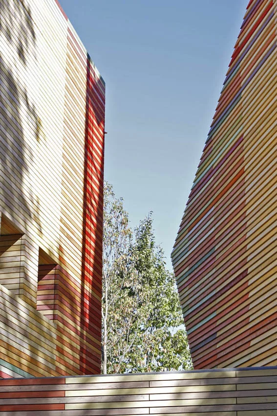 The cubes rest independently to one another, but are linked by walkways made from glass and steel (Photo: Marco Caselli Nirmal)