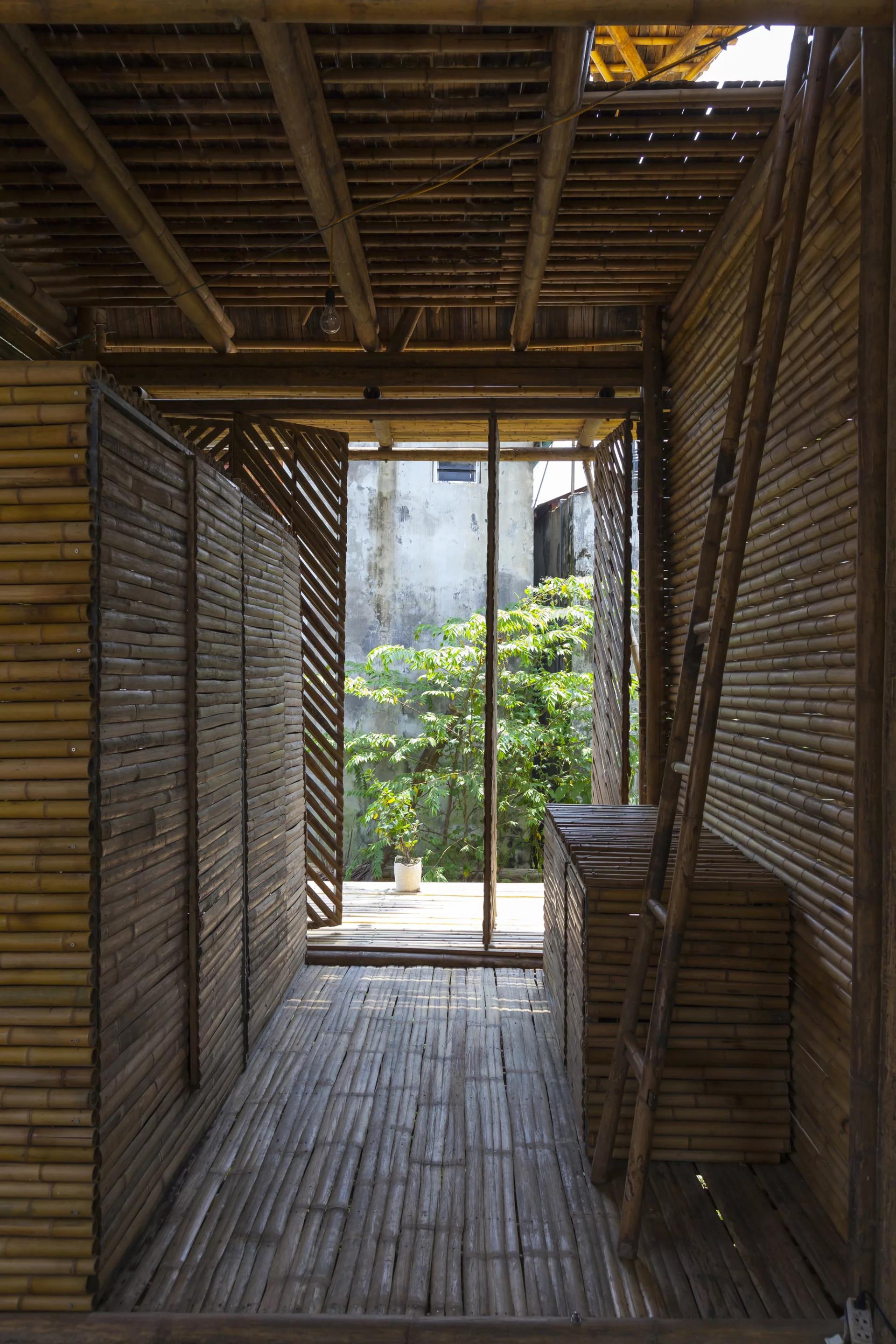 A ladder affords access to the upper floor (Photo: Doan Thanh Ha)