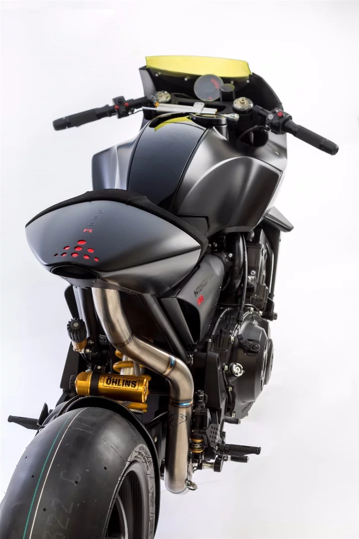 Honda's CB4 Interceptor concept: 4-into-1 exhaust enters the tail section and exits immediately afterward