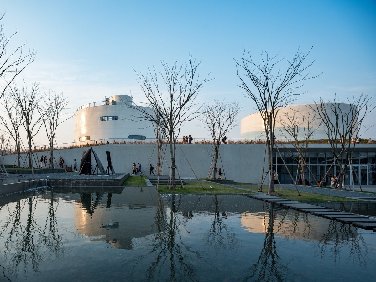 Tank Shanghai's landscaping is significant and includes a water feature