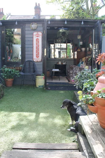 Jo's Garden Shedio, by Joanna Thornhill, is a log cabin-style office and lounge area, and was furnished using vintage furniture. The project is a finalist in the Cabin/Summerhouse category