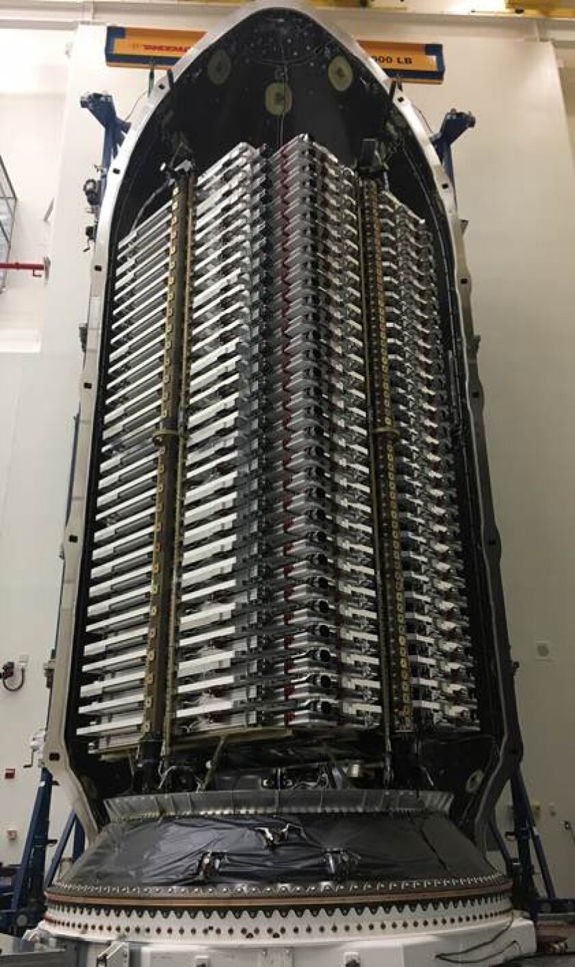 60 Starlink satellites stacked inside the SpaceX Falcon 9 rocket's fairing segment prior to the May 2019 launch