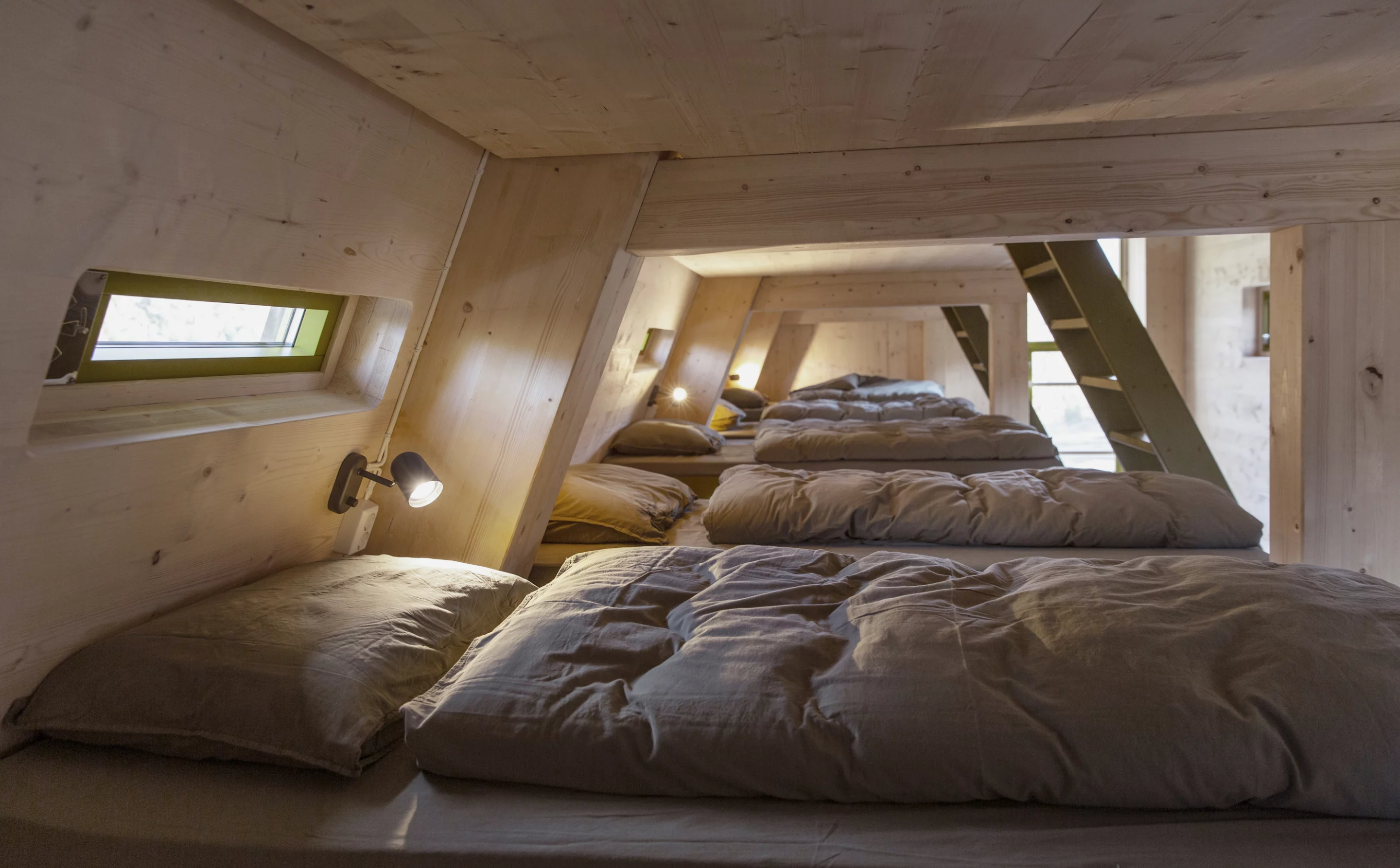 Tungestølen's dormitory cabin features a simple utilitarian shelter