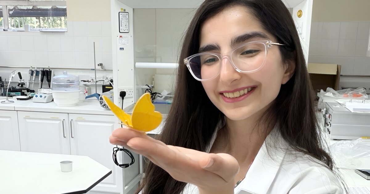 Study lead author Saba Firouznia with a soft robotic butterfly that utilizes the LIMA pump to flap its wings