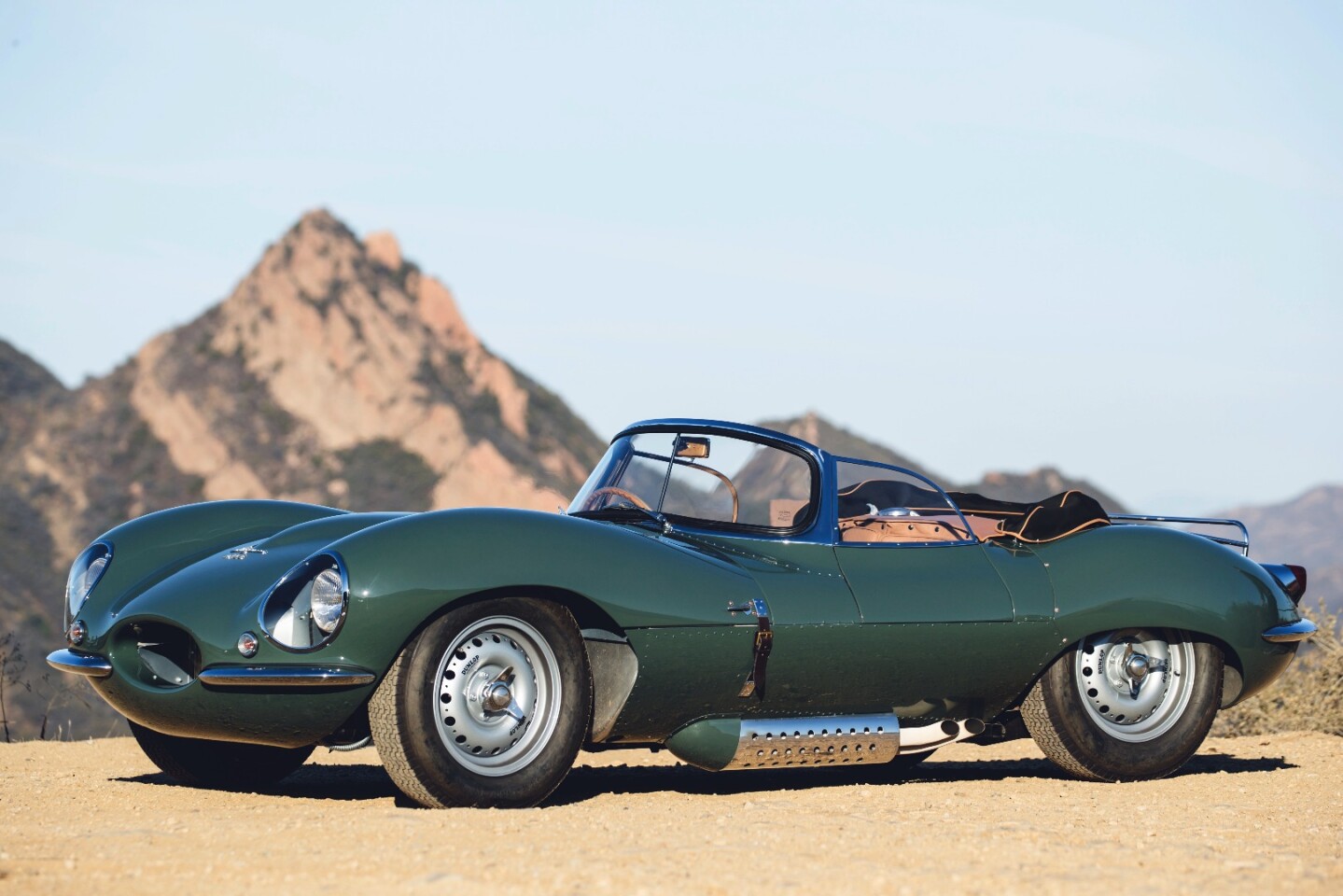 The XKSS has period-spec four-wheel Dunlop disc brakes and Dunlop tires with riveted two-piece magnesium alloy wheels.
