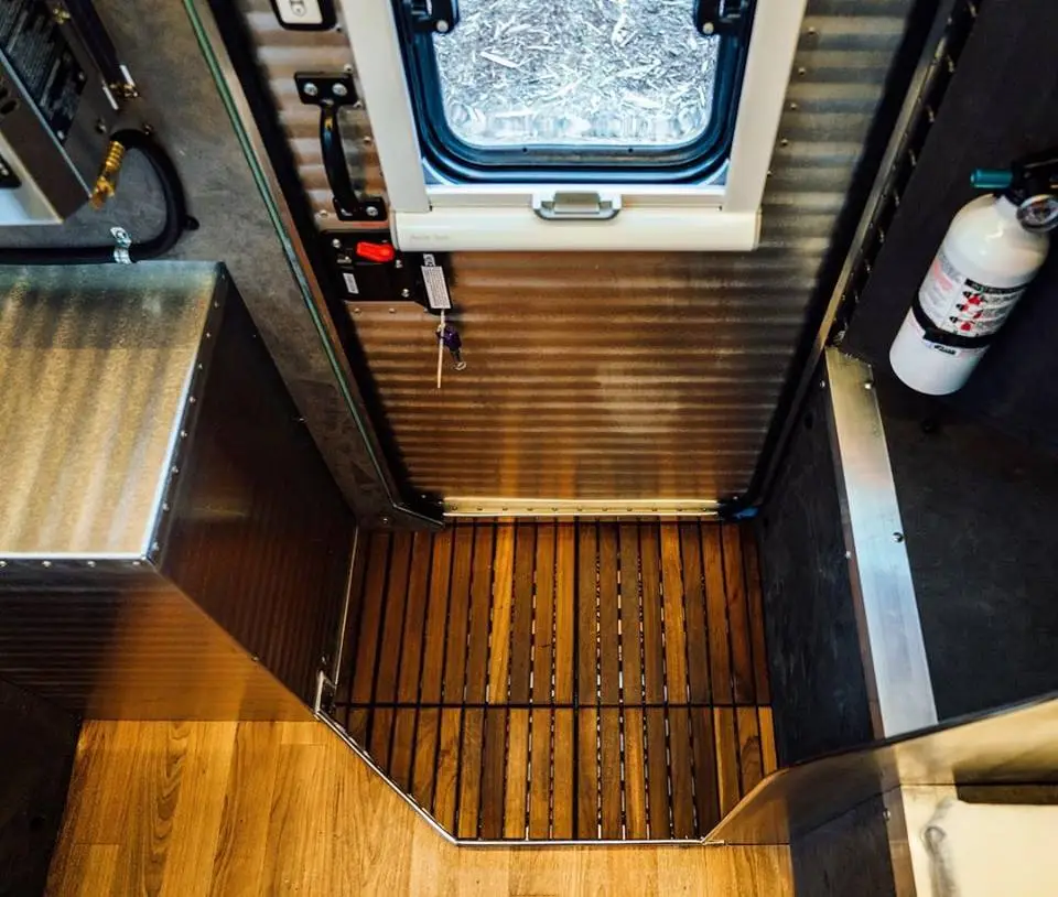 The entryway mudroom with teak floor is part of the standard base package