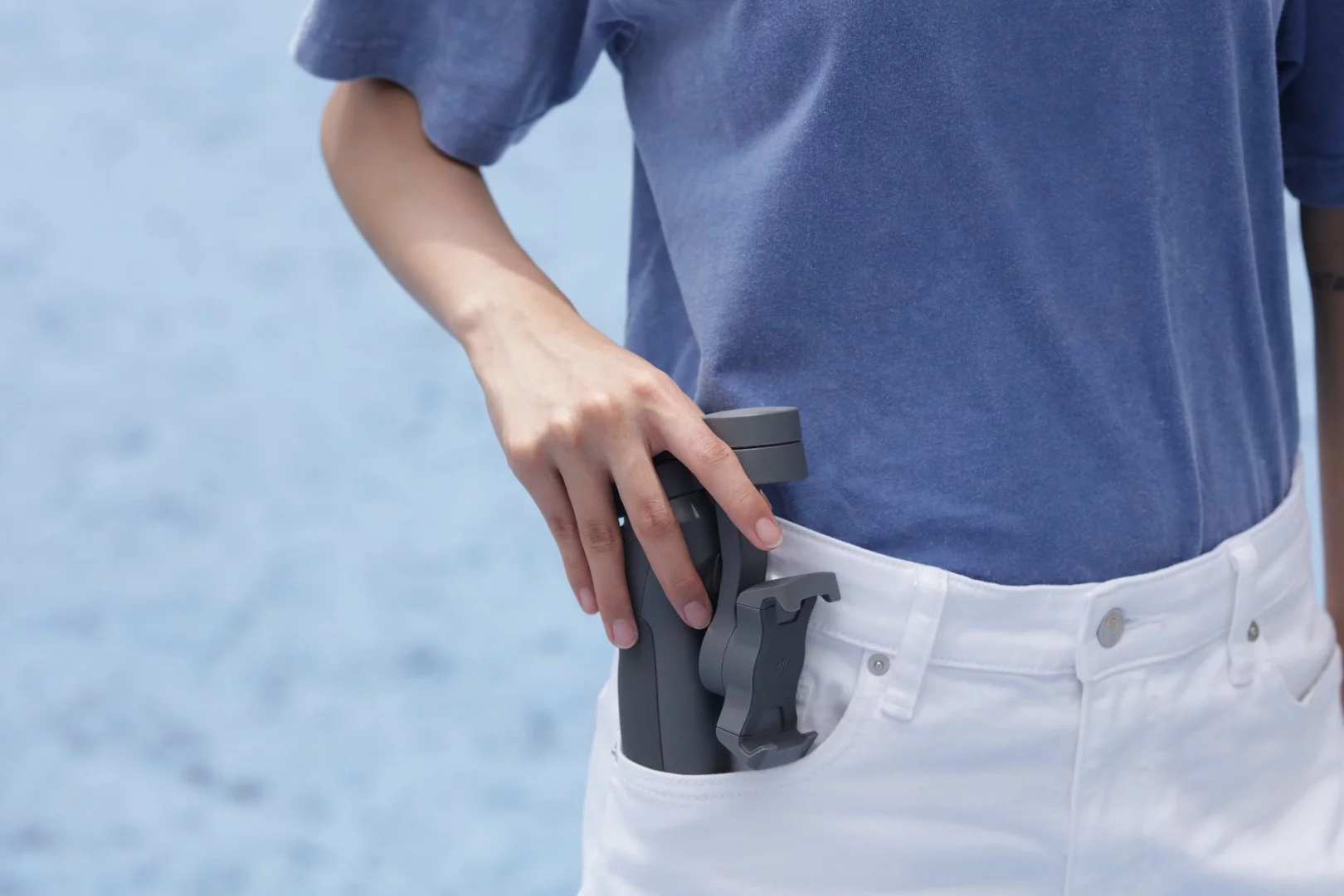 The DJI Osmo Mobile 3 can be folded down to fit in a pocket, but it will stick out of the top and won't be very comfortable to walk