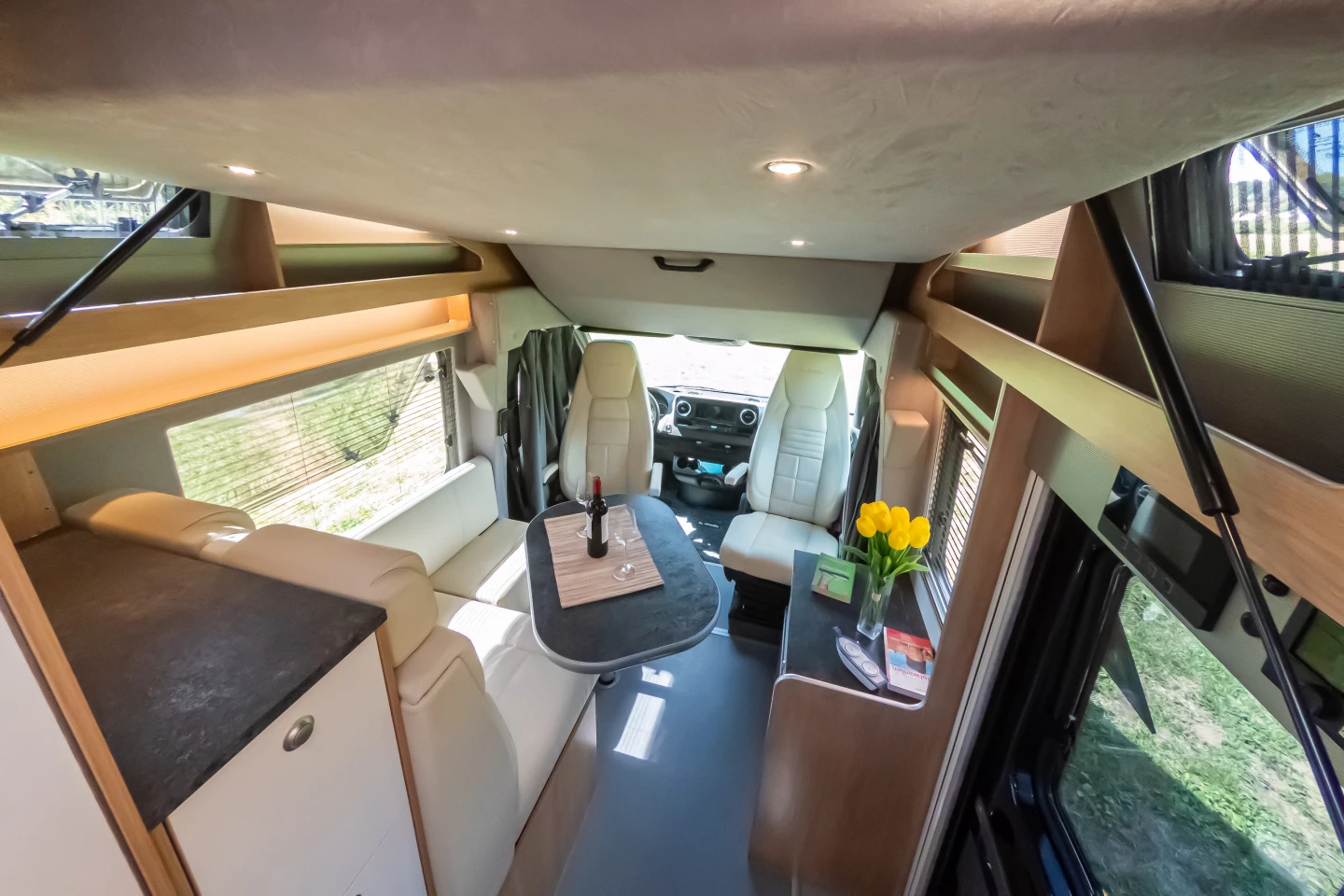 A look at the lifted bed and dining area below