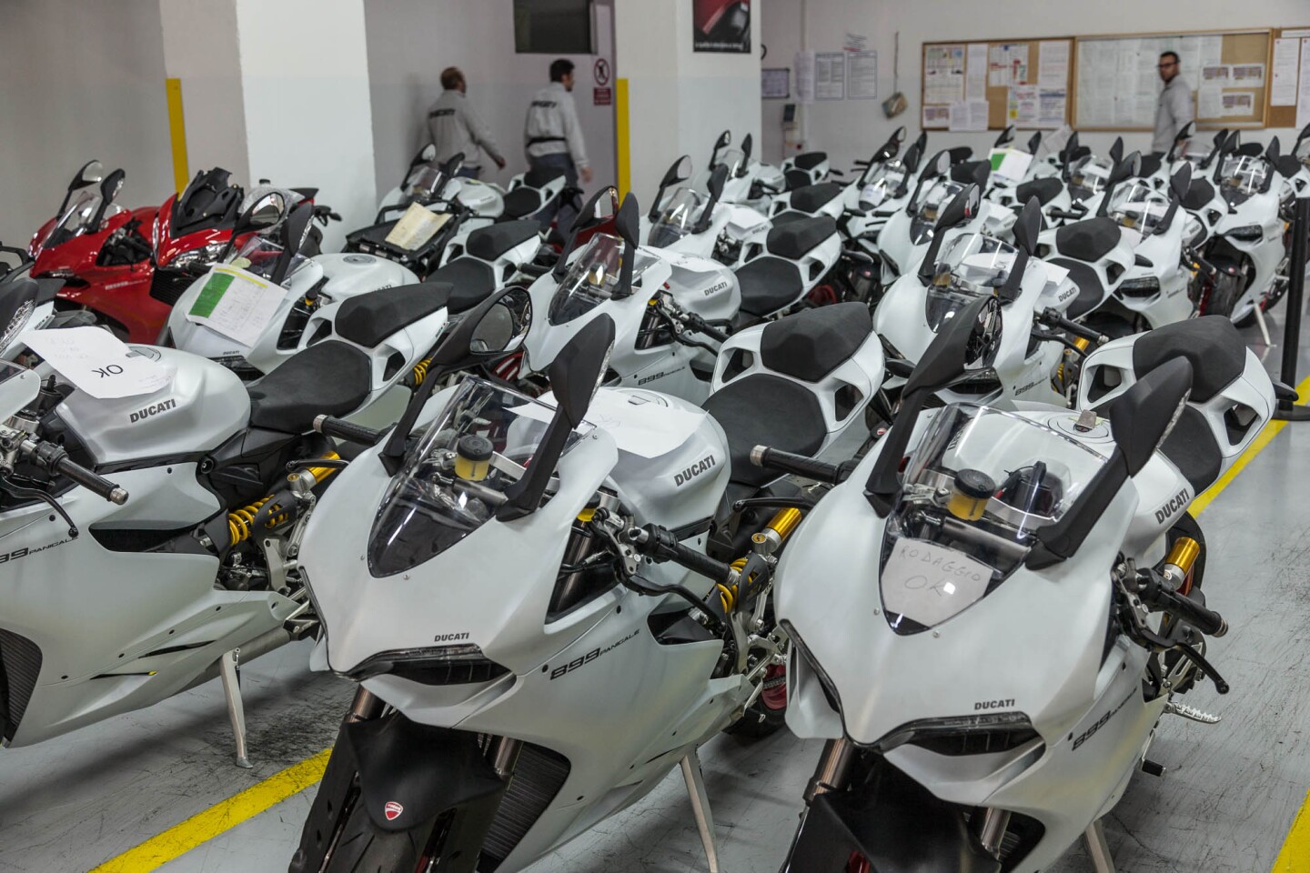 This batch of 899 Panigales has had fairings and road gear fitted, ready for packing and export.