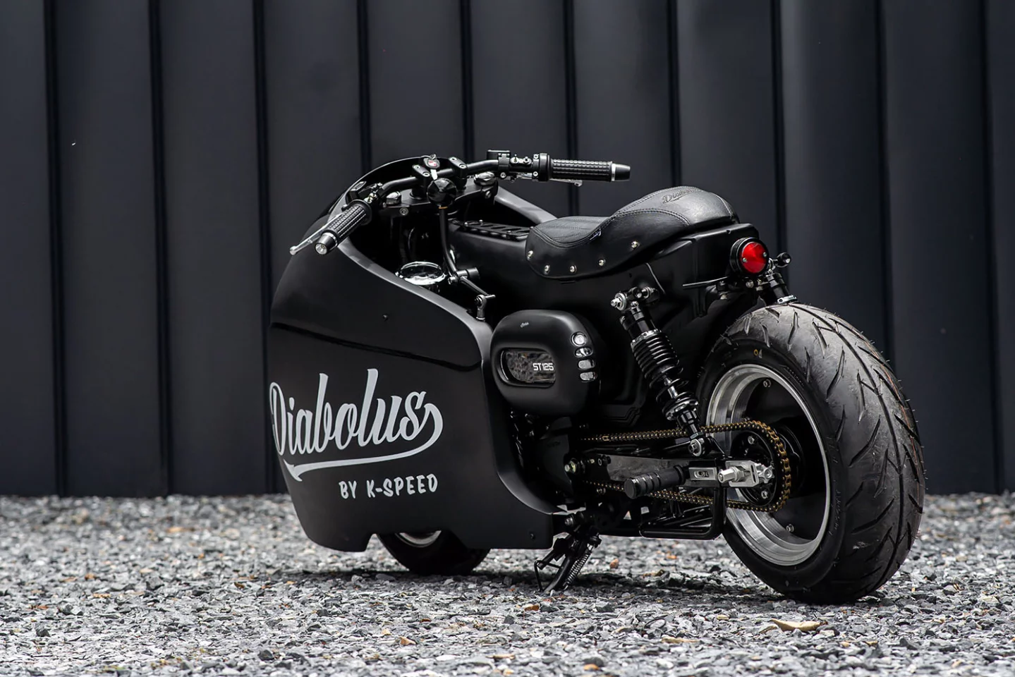 All foot controls in this Honda Dax build are shifted to the handlebar