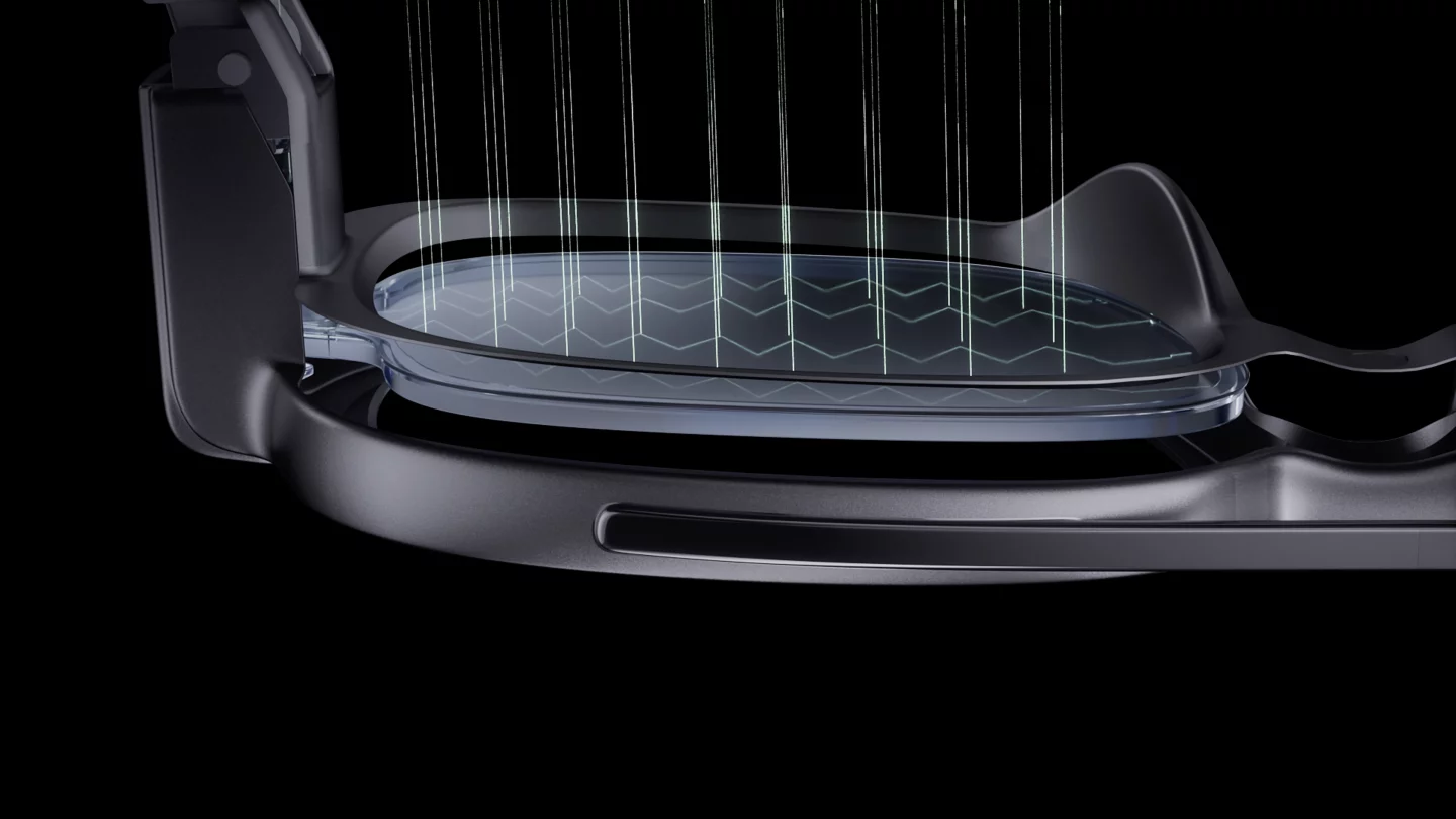 Light from the MicroLED is routed to the wearer's eye via optical waveguides on the lens