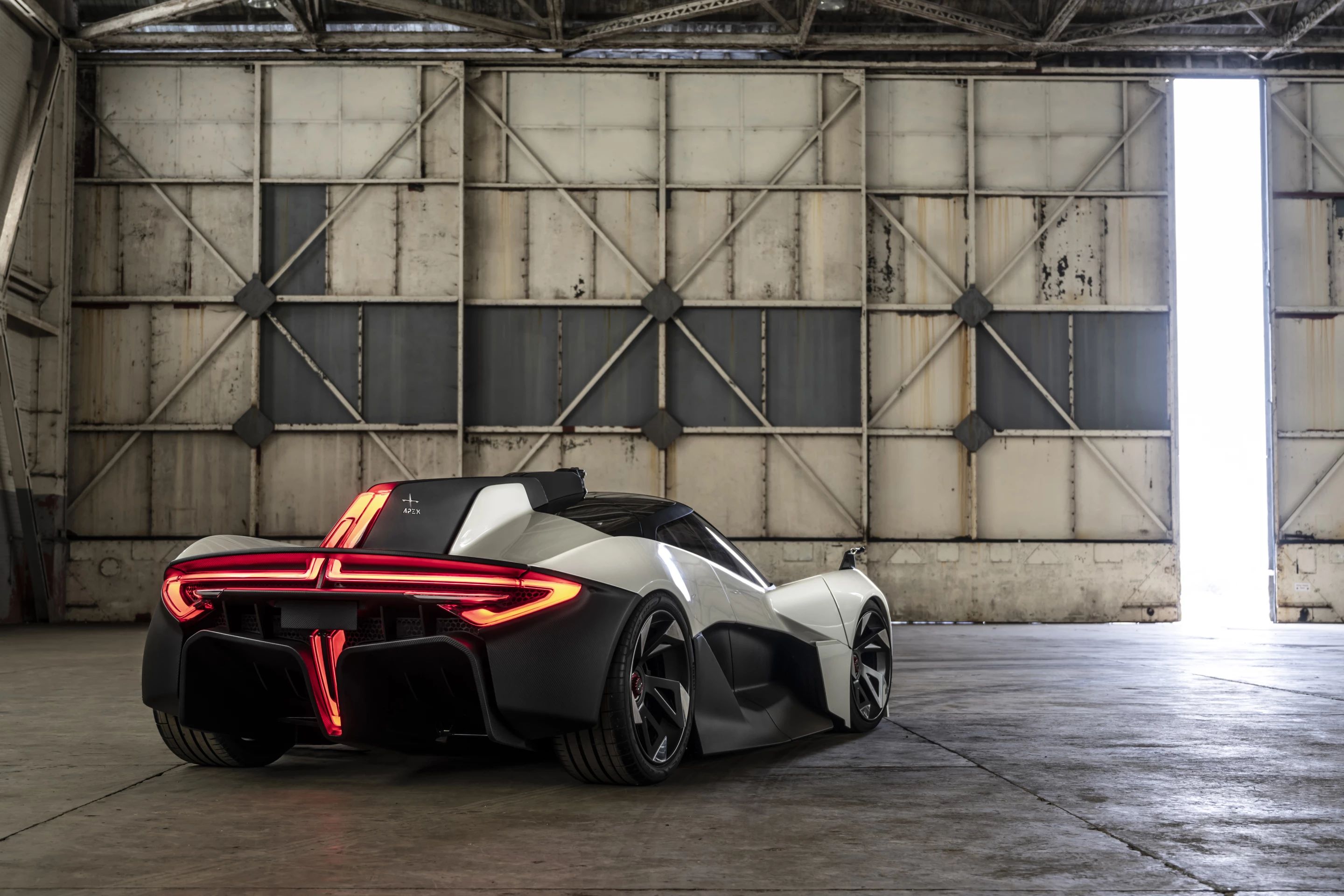The dramatic rear end of the Apex AP-0, a futuristic, fast and long-range electric sports car from the UK