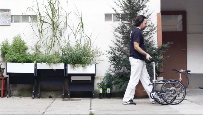 The Vello Bike+ breaks down with two simple folds and can be wheeled like a trolley