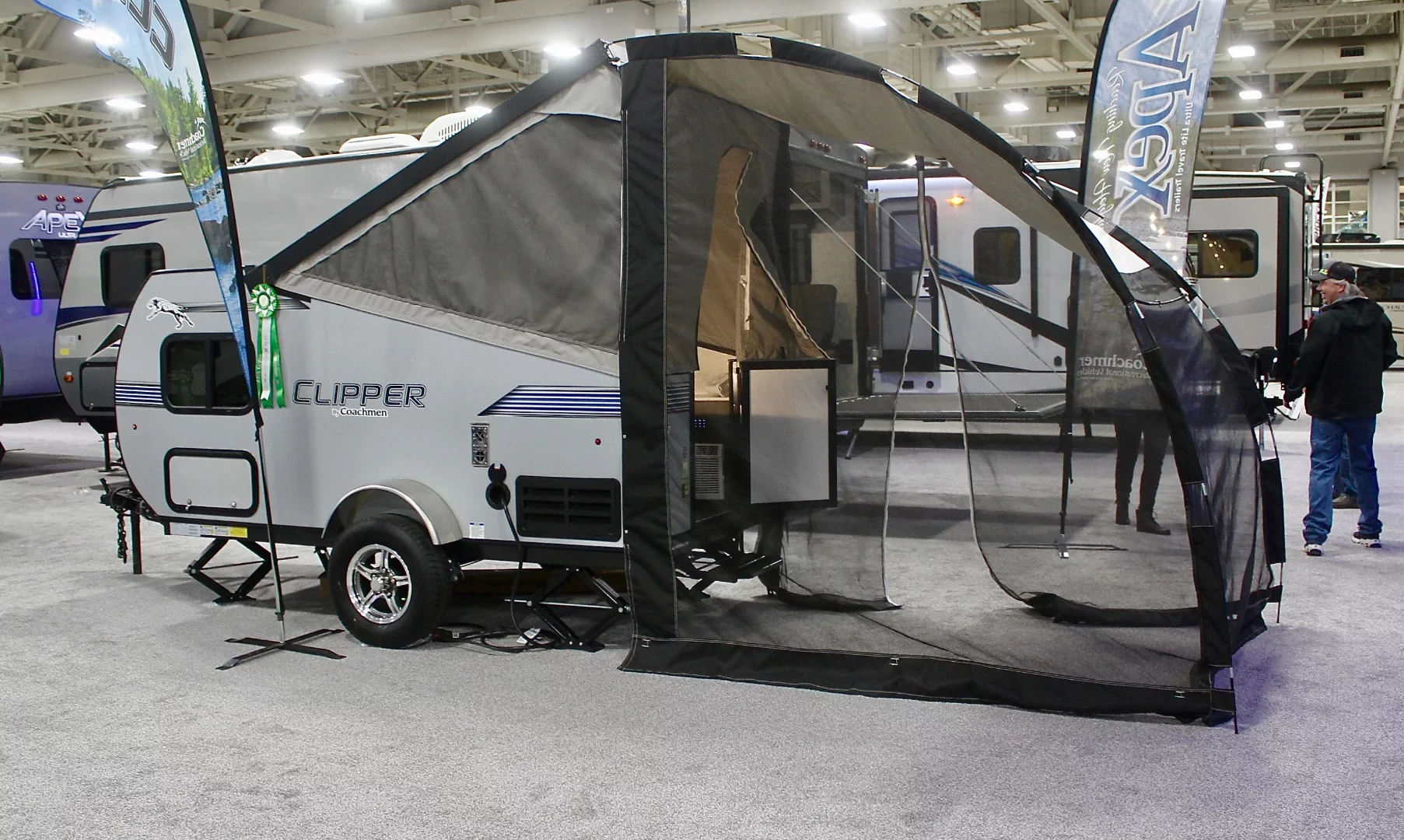 Small camping trailers are growing in popularity, and it's not just startup innovators that are selling them. Here, Coachmen, a motorhome/trailer brand of RV giant Forest River, shows the 13-foot (4-m) Clipper Express 9.0TD (teardrop), a cool, little combination of teardrop and pop-up tent trailer