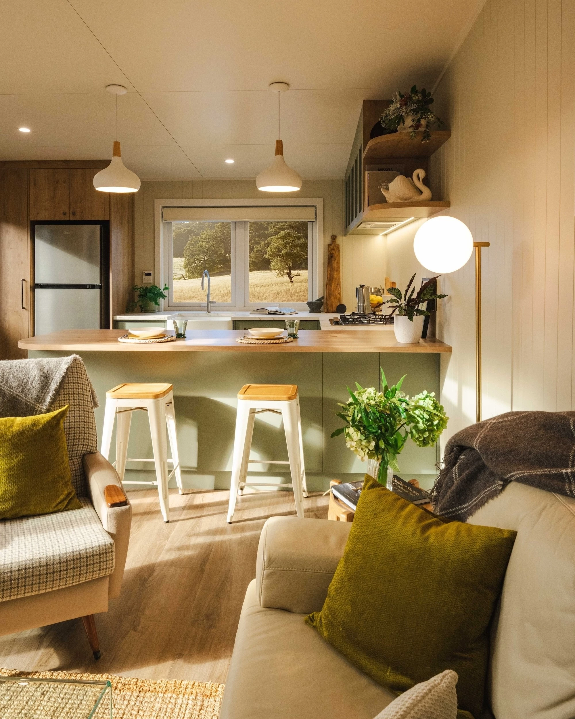 The English Garden's kitchen includes a breakfast bar-style seating area for two