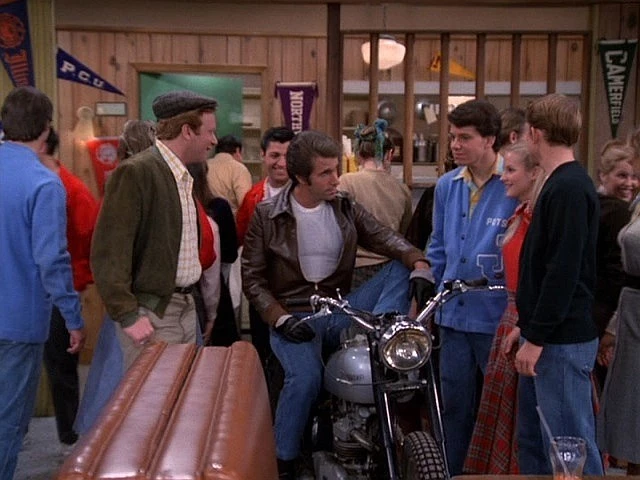 "Happy Days" cast members: Ralph Malph (Don Most), Arthur Fonzarelli (Henry Winkler), Potsie Webber (Anson Williams) and Ritchie Cunningham (Ron Howard) at Arnold's Drive-in. Winkler couldn't ride a motorcycle, so whenever he appeared on the bike on screen, he had to be pushed into shot by crew members.