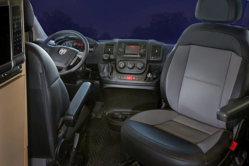 One or both of the front seats can be made to swivel as an option, but unlike vans with the table between the front seats and rear bench, the Off Grid doesn't require swivel seats to seat diners