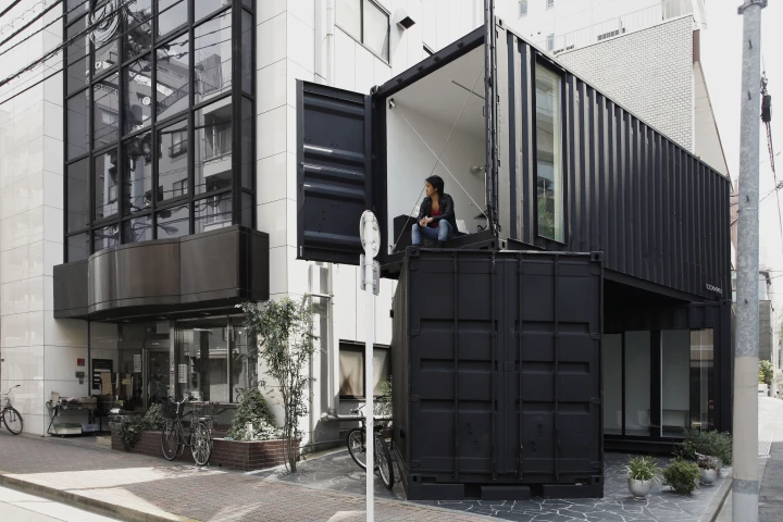 Double story container site disguises a modern office space designed by Japanese architectural firm, Tomokazu Hayakawa