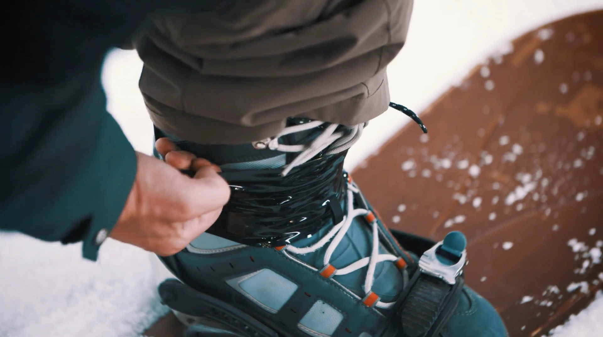 We've actually experienced the issue of a broken snowboard binding strap at the top of the mountain ... but ours was a toe strap, which would be a bit harder to properly Adventure Tape together. Here it secures the ankle to the back of the binding in place of the broken ankle strap