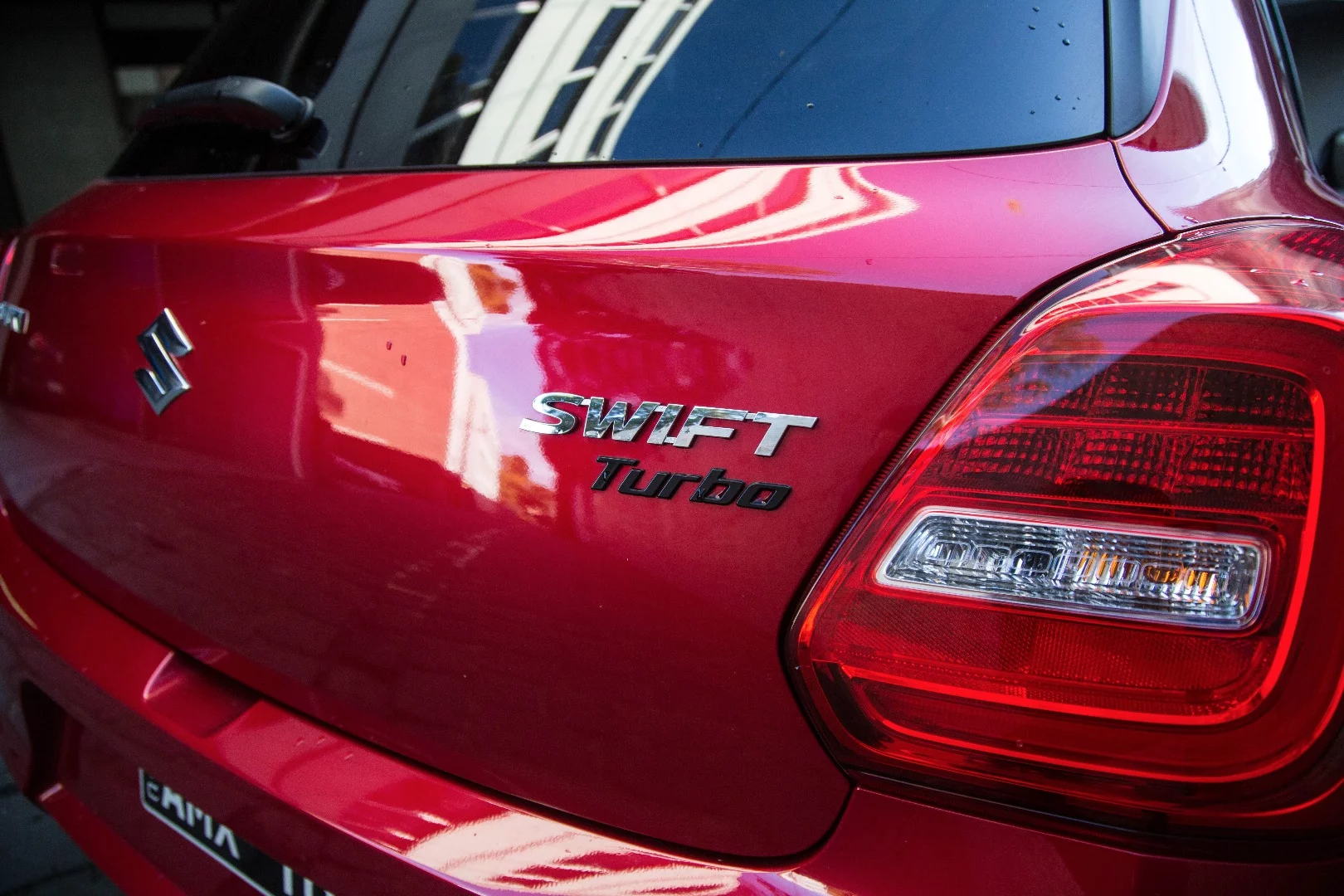 The little Turbo badge signifies a Swift with the three-cylinder BoosterJet turbo engine